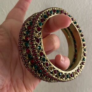Gold Tone Bangle Bracelet with Red and Green Stones